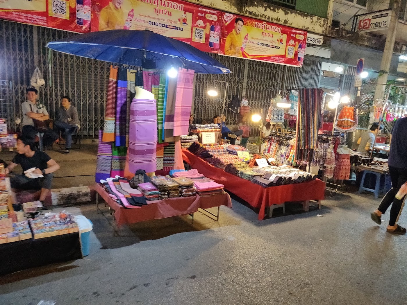 A Chiang Mai street lined with market stalls and shops