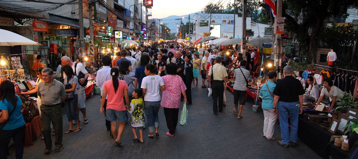 Evening market stalls and lights near Tha Pae Gate